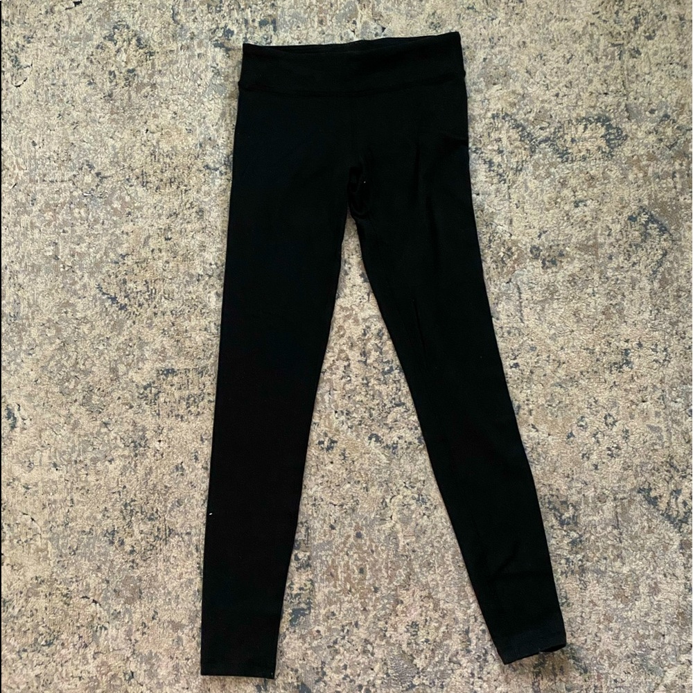 Ivivva Black low-rise leggings.